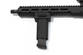 A close-up of a black tactical firearm accessory, specifically a vertical foregrip for KelTec Sub2000 Gen 3 in 9mm. attached to a picatinny rail handguard, on a plain white background.
